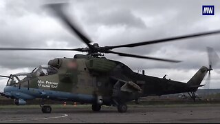 Russian Mi-35 multi-purpose attack helicopters crew in combat mission