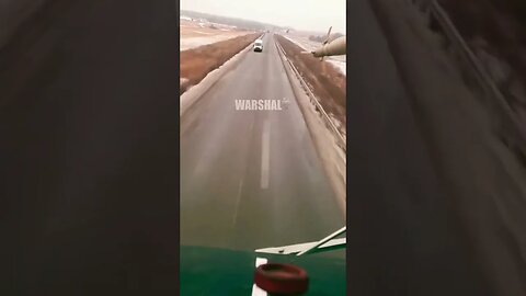 Ukrainian Helicopter Flying down the highway POV