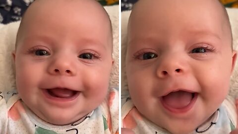 Adorable photogenic baby smiles every time mom puts the camera on