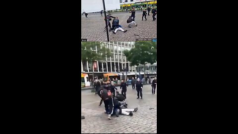 Knife Attack in Mannheim Germany by Muslim Asylum Seeker (Two Camera Angles - Top and Bottom)