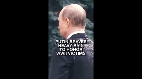 Putin braves heavy rain to honor WWII victims