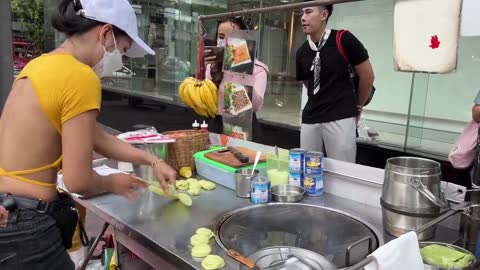 Beautiful girl making Delicious street food