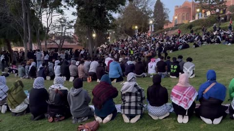 Hundreds of American students convert to Islam and participate to call to prayer at UCLA.