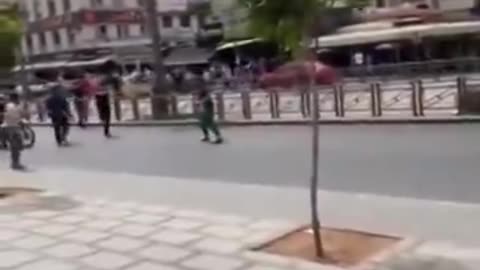 Muslim with knife attacks people in Morocco and police put him down like a wild animal.mp4