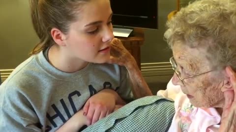 Granddaughter and Grandmother Sing Together