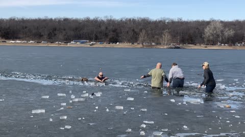 Stranger Rescues Dog After It Falls Through Ice on Frozen Lake