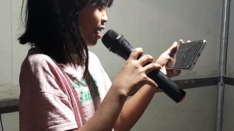 Practice singing a cute pilipina girl