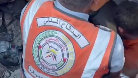 Gaza Civil Defense teams spent eight hours rescuing a young Palestinian man trapped under rubble