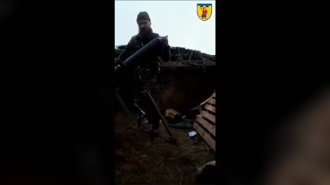 Moment Ukrainian Soldier Attaches White Flag To Mortar Shell Before Firing It At The Russians