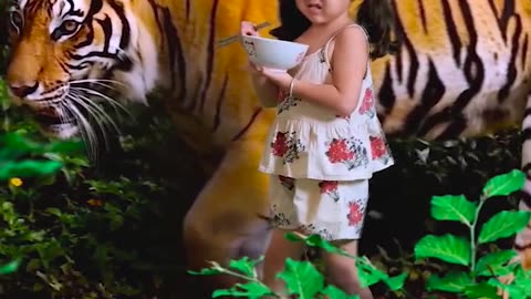 The girl and her tiger pet