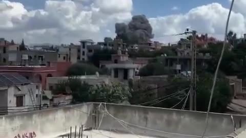 Footage shared by Lebanese media of an Israeli airstrike in the village of Ansar