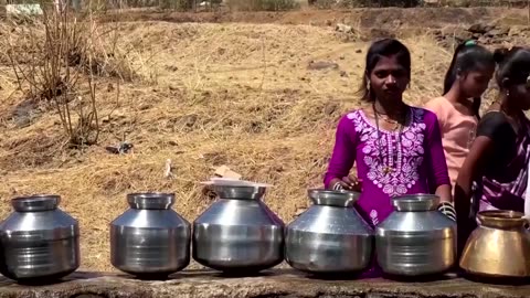 People draw water from rivers, well as heatwave grips India