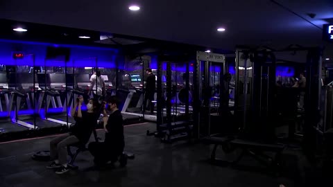 A S. Korean gym, on its first day without masks