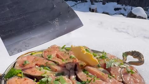 Cooking rice with anchovies on bricks in winter camping