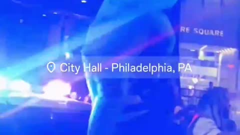 violent mob attacks a Philadelphia police officer in his cruiser last night