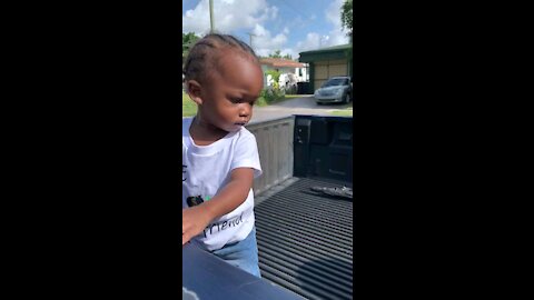 Baby boy playing ball