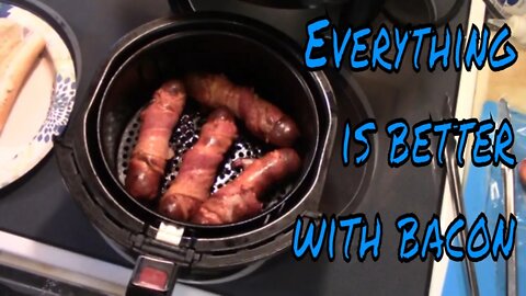 What's Cooking With The Bear? Bacon wrapped cheddar dogs.