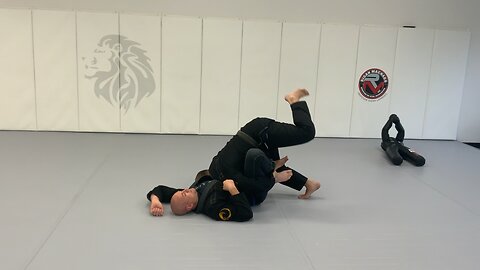 Headstand Pass from Butterfly Guard in Brazilian Jiu-Jitsu