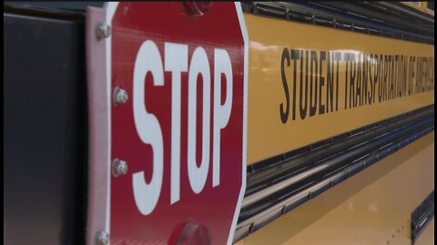 Early Risers: Getting on the bus and heading to school