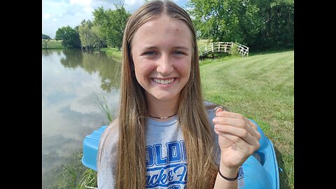 Metal detecting for a lost ring in a lake.