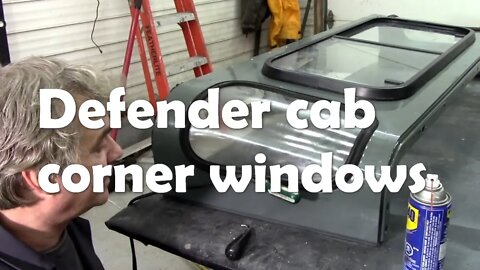 Defender pick up cab. Putting the corner windows in with WD40 and a cheap paint gun set Pt1