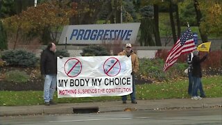 Demonstrators gather outside of Progressive in Mayfield to protest vaccine policies