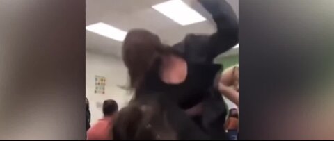 What can Clark County School District teachers do to break up fights?