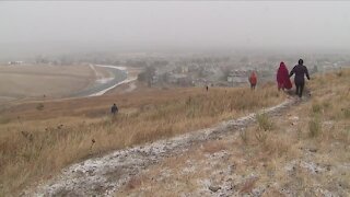 Even in snow, homeowners hike to check status of homes in Superior neighborhood