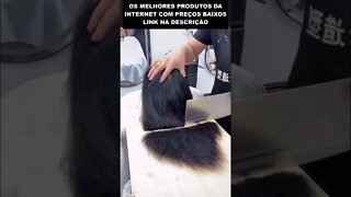 cortando o cabelo com facão