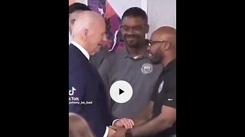 Biden caressing man's arm