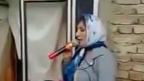 Woman singing a beautiful Azari song a in a wedding