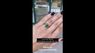 3.92 carat Dark Vivid Muzo Green Colombian emerald bezel set solitaire anniversary ring in 18K