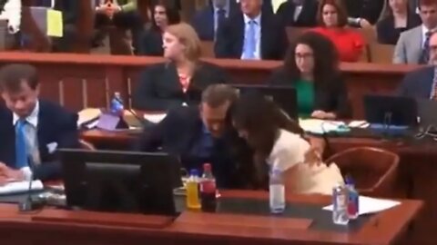 Johnny depp being sweet to his lawyer Camille Vasquez