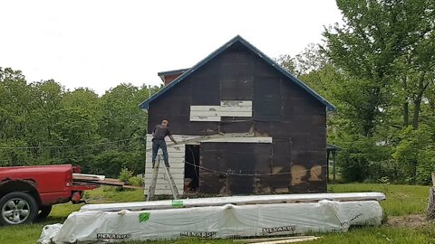 Prepping for New Siding, Tearing Off and Moving Door. East wall.