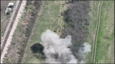 Ukrainian Army shows a mortar or artillery attack on a foot patrol of Russian troops!