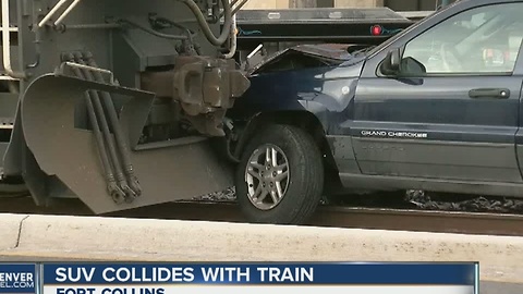 SUV collides with train in Old Town Fort Collins