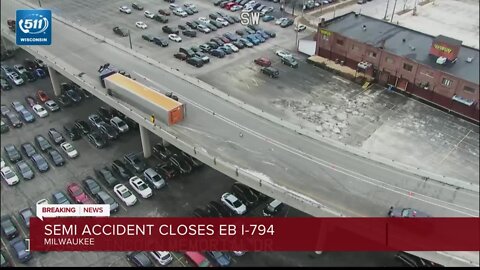 Semi rollover: I-794 east closed at Van Buren