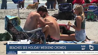 Marine layer, cool breeze don't stop beachgoers