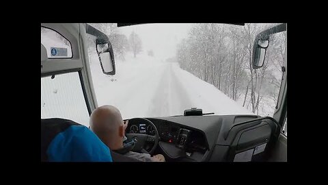 Bus drive in the Alps snow season