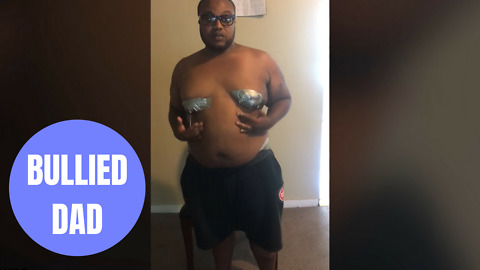 Bullied dad forced to strap down his C-CUP BREASTS with duct tape