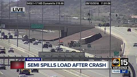 Beer kegs spill onto I-17 during truck rollover