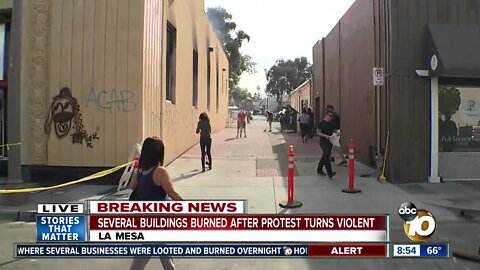 Cleanup begins after protest turns violent, several buildings burn