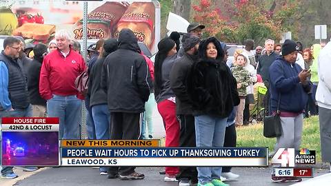 Customers line up early to pick up turkeys from Fritz's in Leawood