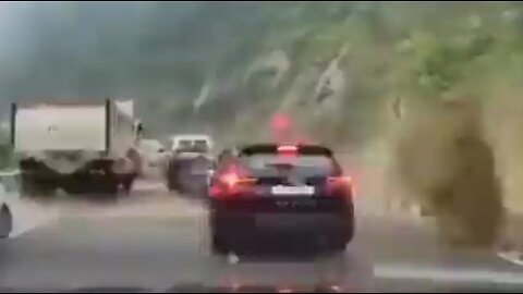 OMG. Huge Boulder Flattens 2 Cars