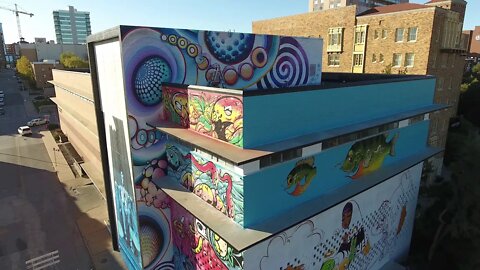 Artists paint 5-story murals over the recently vandalized Plaza Medical Building | Block & Company