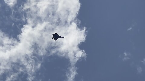 F22 backflips in a cloud