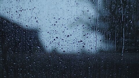 calming waterdrops on a window