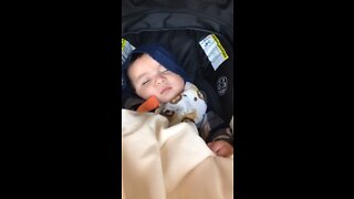 Baby having a happy dream