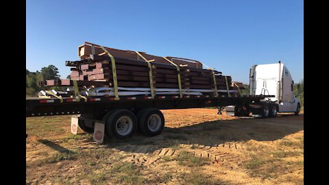 Couple Builds 50x100x16 Metal Building....DIY. Episode 2; Telehandler and Metal Building Delivered!!!