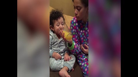 Toddler Loves to Laugh about Orange Juice